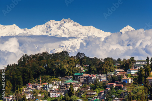 Darjeeling and Kangchenjunga on the background. Kanchenjunga, is the third highest mountain in the world. Beautiful Himalayan landscape near Nepal and Sikkim. Indian Himalayas. © Viktar