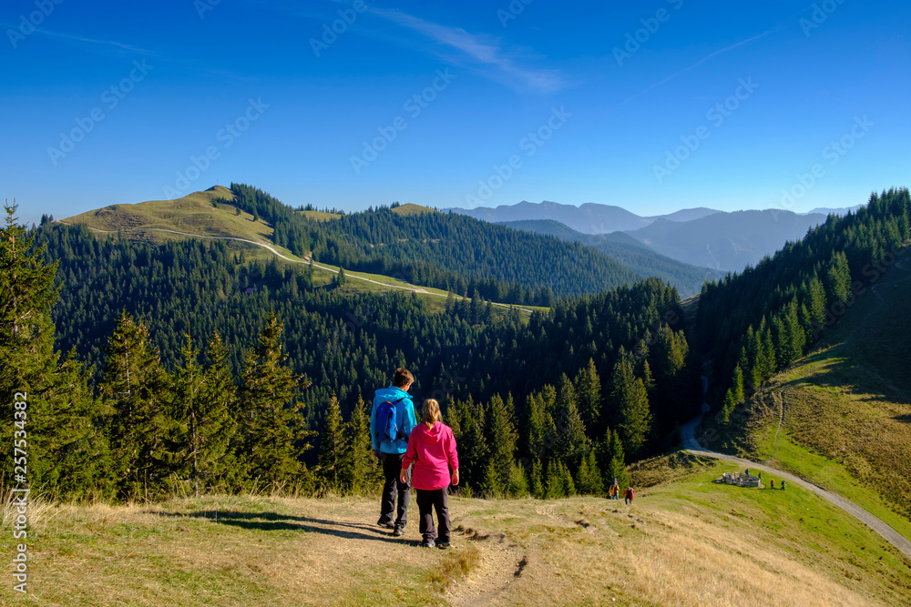 Germany, Bavaria, Hoernle near Bad Kohlgrub, young couple on a hiking trip in alpine landscape Germany, Bavaria, Hoernle near Bad Kohlgrub, young couple on a hiking trip in alpine landscape