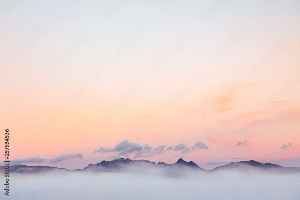 Lyell Range shrouded in clouds at dusk Lyell Range shrouded in clouds at dusk