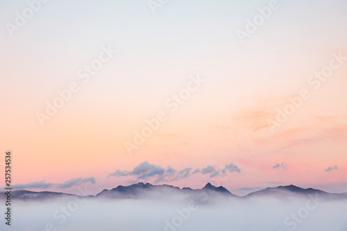 Lyell Range shrouded in clouds at dusk