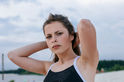 sullen girl on the beach