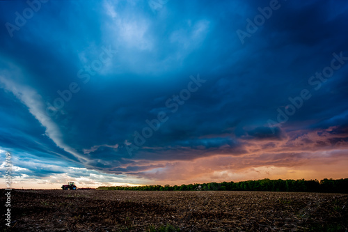 Dramatic sky over field, Marshfield, Wisconsin, USA © Cavan Images