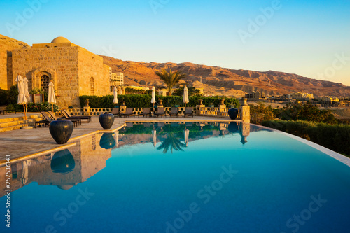 Infinity pool in resort near Dead Sea, Madaba Governorate, Jordan photo