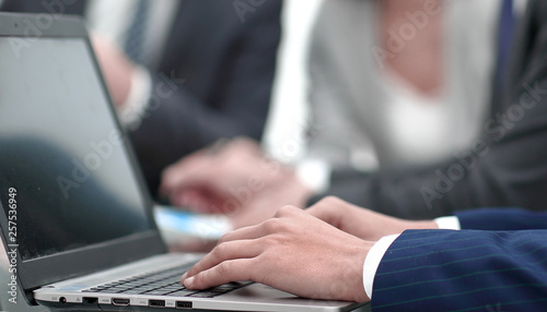 close up.businessman typing on laptop