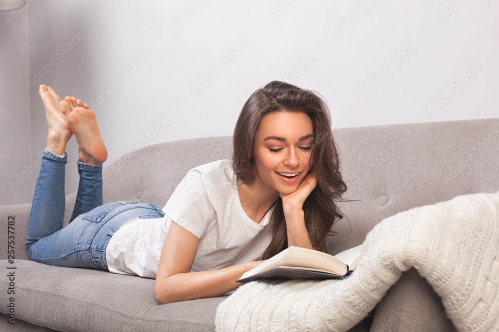 Beautiful young woman reading book Beautiful young woman reading book