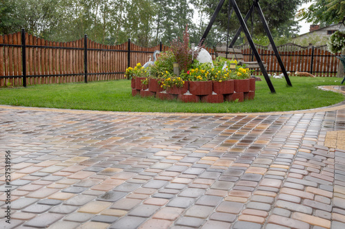 Paving cube in gardenin rainy weather photo