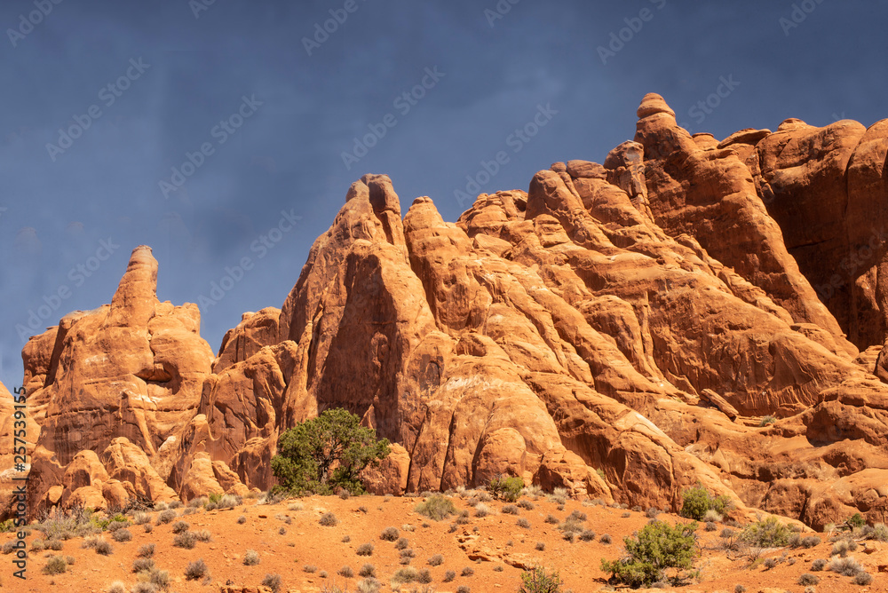 Extreme spires rise out of the landscape in Utah desert.