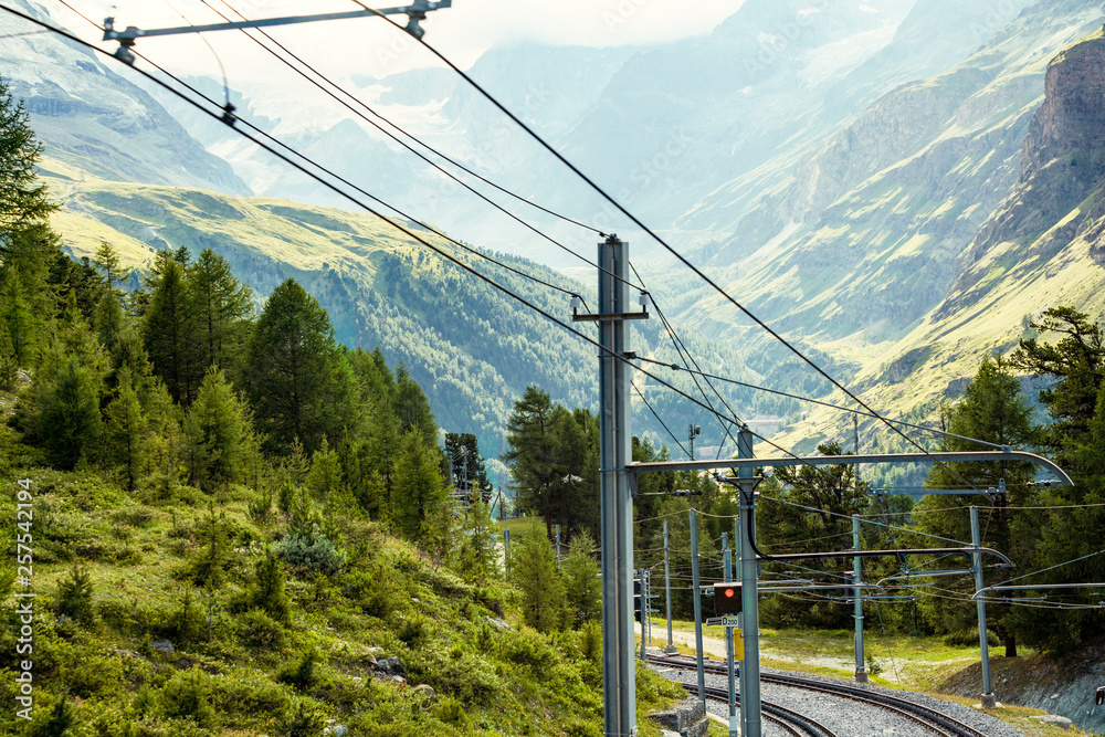Mountainscape with gondola tracks for alpine cable car, Zermatt, Valais, Switzerland Mountainscape with gondola tracks for alpine cable car, Zermatt, Valais, Switzerland