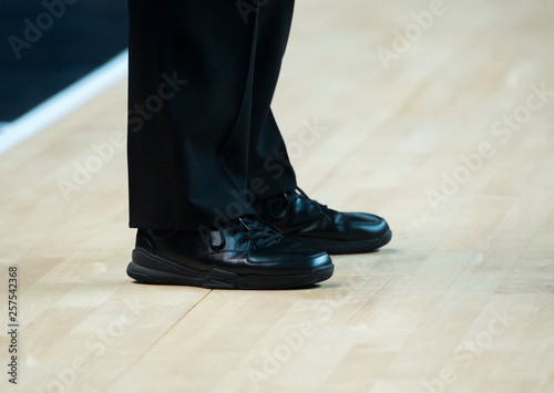 basketball referee shoes on the floor in the gym