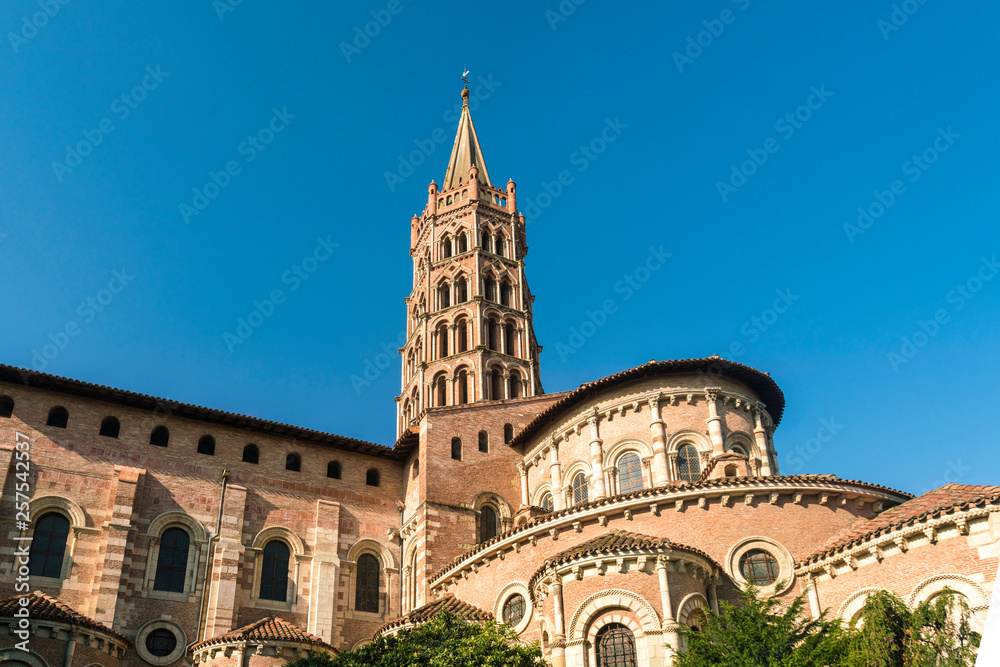 Basilique Saint-Sernin de Toulouse under clear sky, Toulouse, Occitanie, France Basilique Saint-Sernin de Toulouse under clear sky, Toulouse, Occitanie, France