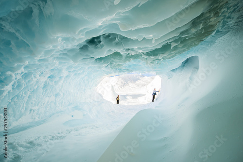 A tunnel through an iceberg stuck in the frozen surface of the McMurdo Sound in the Ross Sea Region of Antarctica.