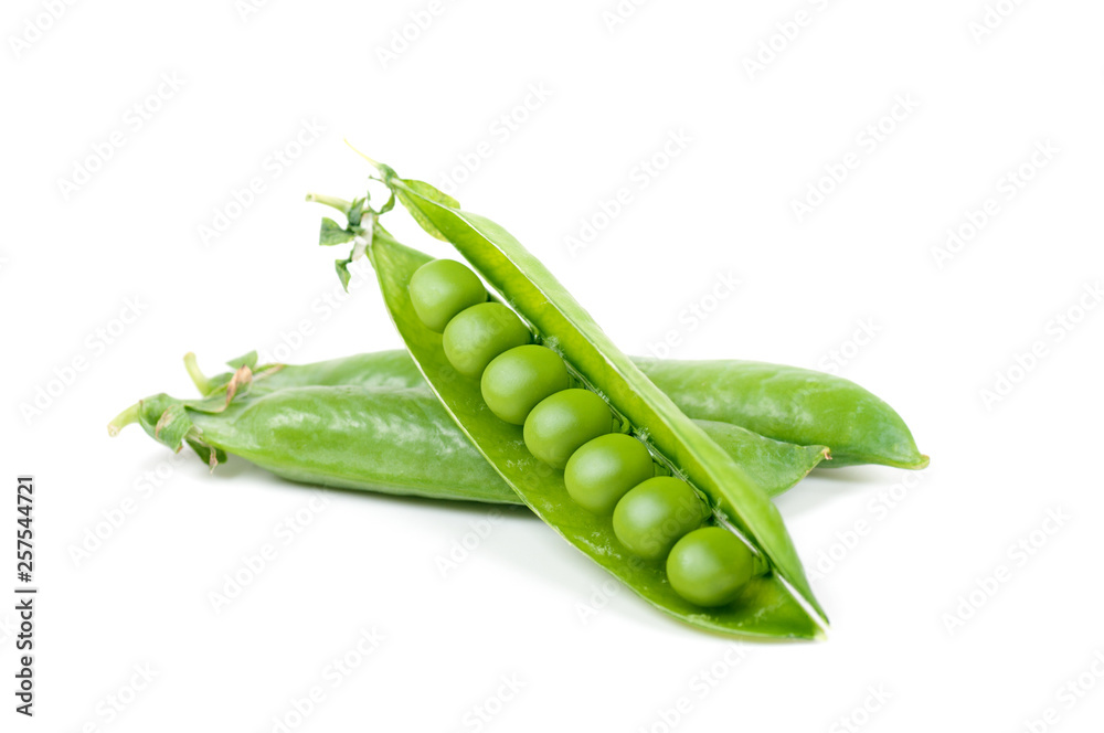 green peas in pods on a white background green peas in pods on a white background