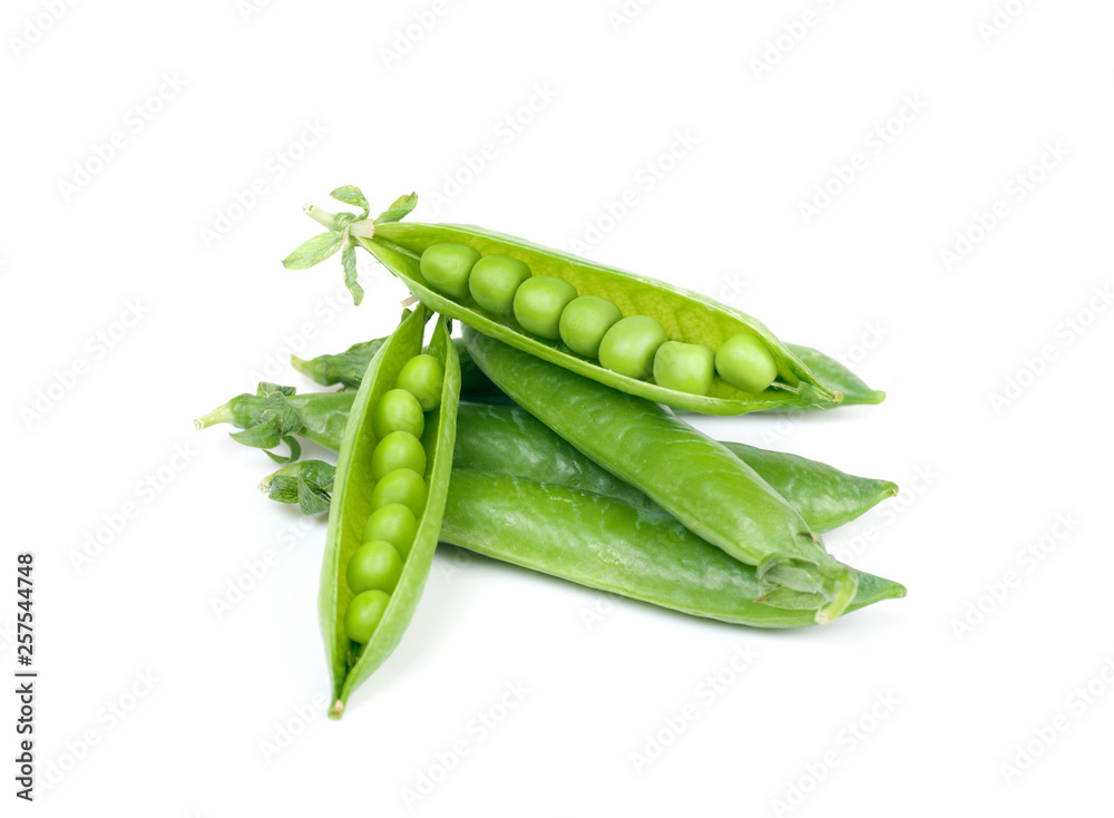 green peas in pods on a white background green peas in pods on a white background