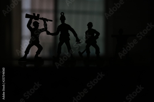 silhouette of soldier in combat position