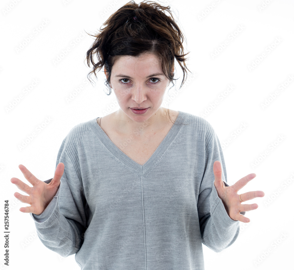 Portrait of a desperate young woman with angry face looking furious. Human expressions and emotions Portrait of a desperate young woman with angry face looking furious. Human expressions and emotions