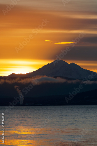 Sunrise Over the Active Volcano  Mt. Baker  in the North Cascade Mountain Range. Mt. Baker is one of the snowiest places in the world and is located 31 miles east of Bellingham  Washington.