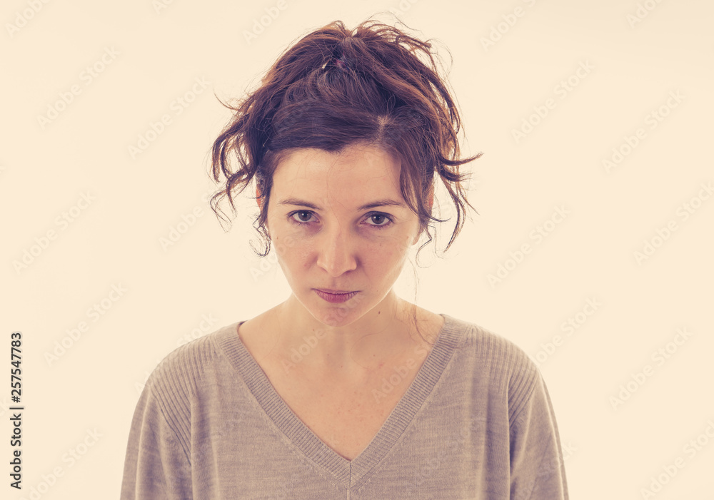 Portrait of a desperate young woman with angry face looking furious. Human expressions and emotions Portrait of a desperate young woman with angry face looking furious. Human expressions and emotions