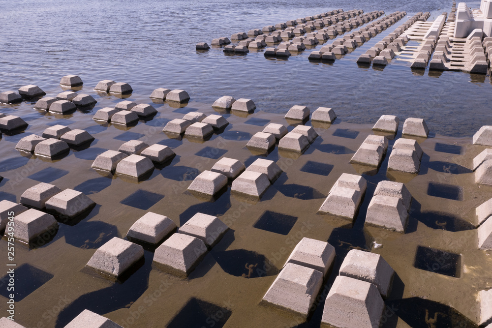 Fototapeta premium Breakwaters of the river