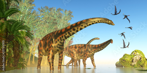 Spinophorosaurus Dinosaur Marsh - Dorygnathus reptile birds fly close to a Spinophorosaurus dinosaur herd during the Jurassic Period. photo
