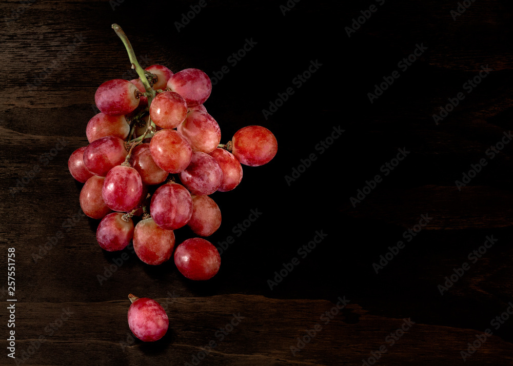 grapes on wood table grapes on wood table