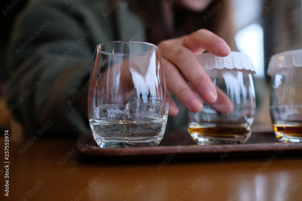 Whiskey tasting - lady's hand