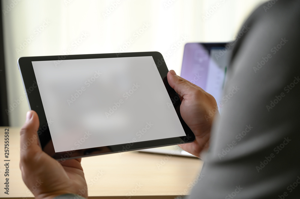 man hands multitasking man using tablet close up close up working in office man hands multitasking man using tablet close up close up working in office