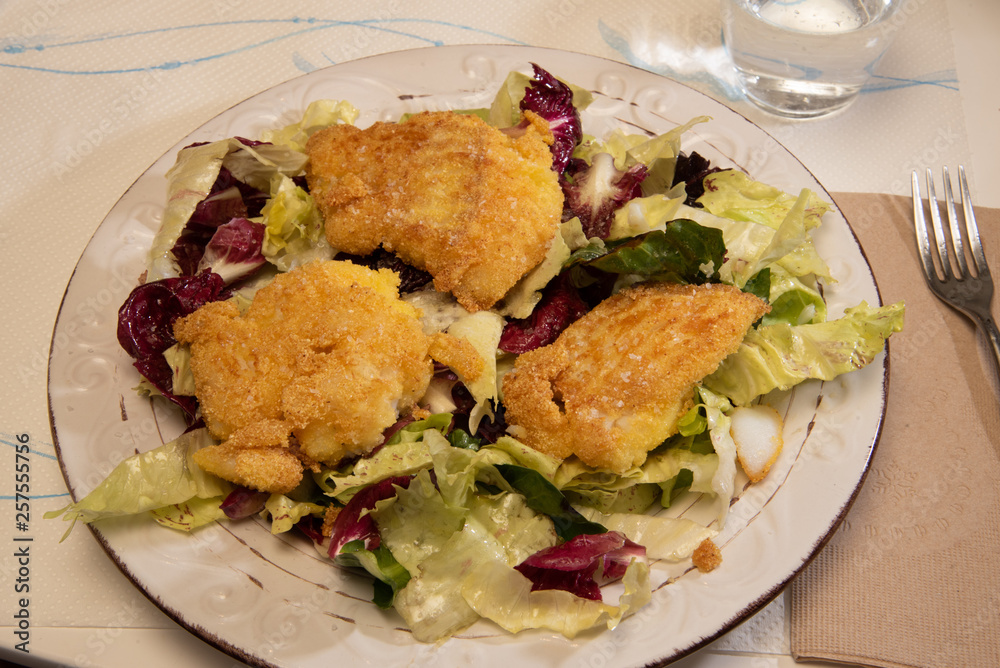 Fotografie Merluzzo gratinato in insalata