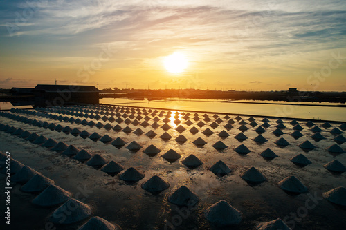 Beautiful landscape at sunset salt Farming. sea-salt production in the country, Sunset in Salt farming at Samut Sakhon Thailand.