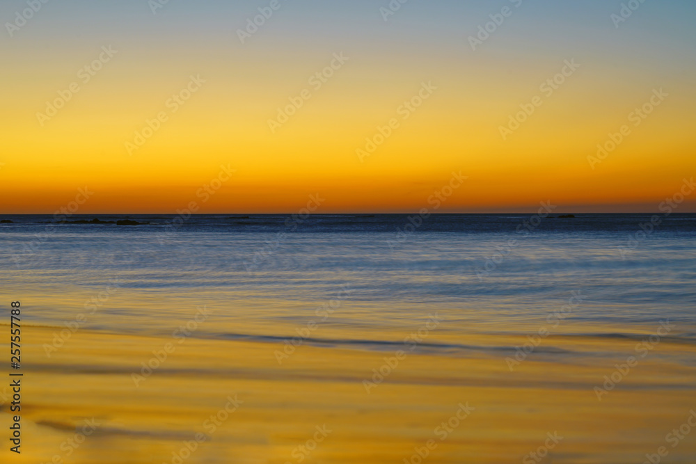 Dramatic orange sunset sky over the Playa Virador beach in Peninsula Papagayo, Guanacaste, Costa Rica