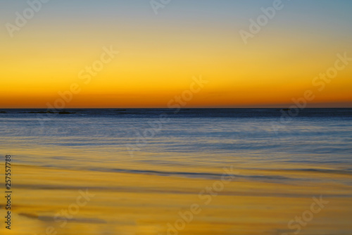 Fototapeta Naklejka Na Ścianę i Meble -  Dramatic orange sunset sky over the Playa Virador beach in Peninsula Papagayo, Guanacaste, Costa Rica