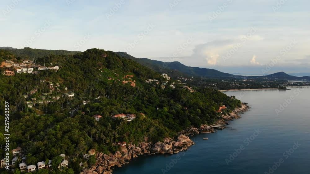 Aerial view of tropical sea and beach on white cloud and blue sky Aerial view of tropical sea and beach on white cloud and blue sky