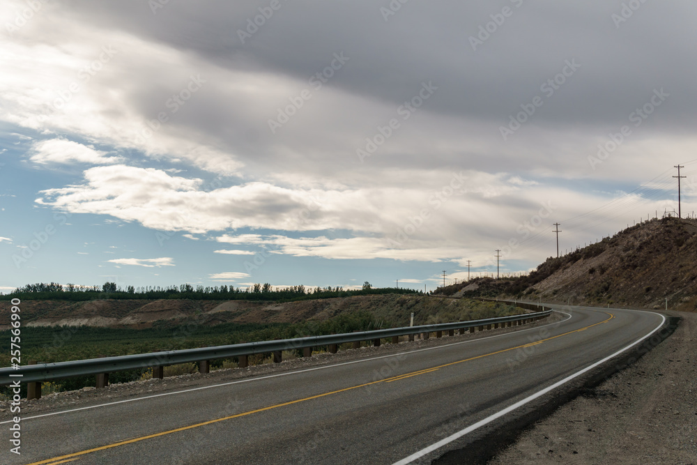highway or road in north washington USA with cloudy sky.