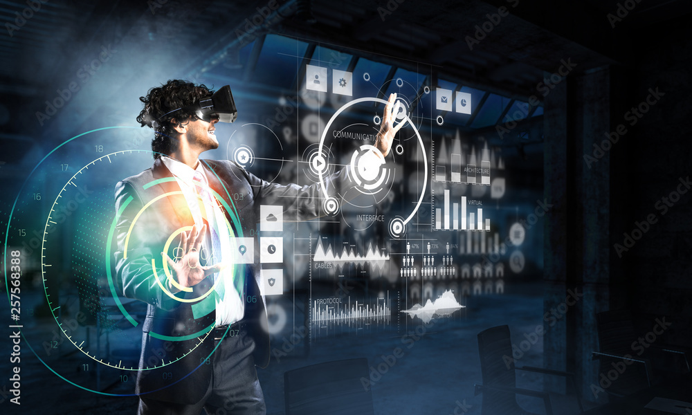 Fototapeta premium Businessman having VR experience. Mixed media