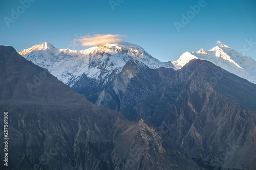 Sunrise at Nagar valley with a view of snow capped Rakaposhi mountain in Karakoram range. Gilgit baltistan, Pakistan.