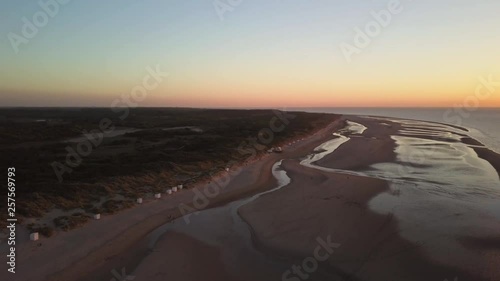 Sunset at the Dutch beach Breezand in Zeeland. Aerial shot. photo