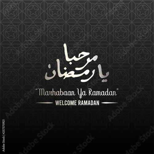 Marhaban ya ramadan. islamic design concept with arabic calligraphy and middle east pattern style.dark background with silver metallic color. vector illustration. photo