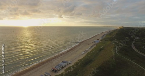 Aerial: The beach between Vlissingen and Dishoek during sunset. photo