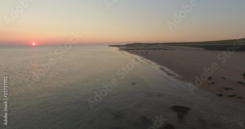 Aerial: The beach between Vlissingen and Dishoek during sunset. photo