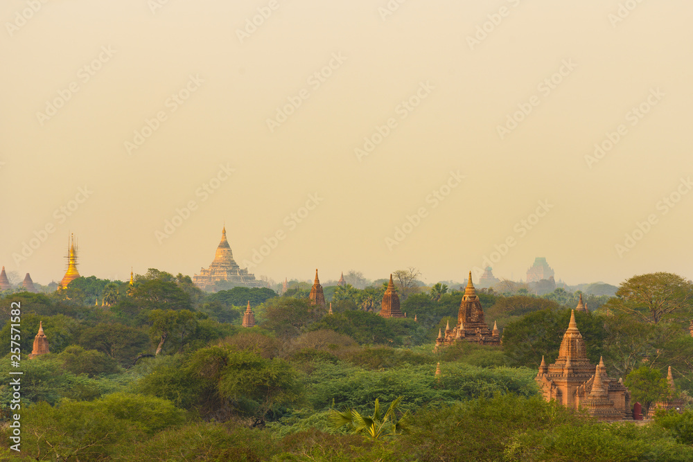 Stunning view of the beautiful Bagan ancient city (formerly Pagan) during sunset. The Bagan Archaeological Zone is a main attraction in Myanmar and over 2,200 temples and pagodas still survive today.