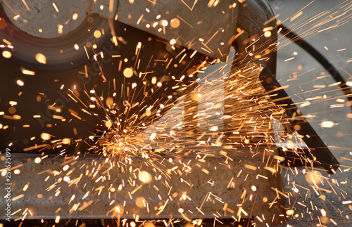 Beautiful stream of spark form iron cutter