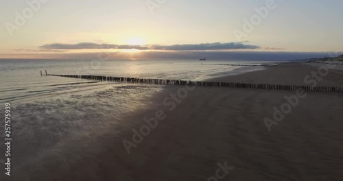 Aerial: The beach between Vlissingen and Dishoek during sunset. photo