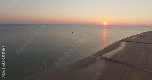 Aerial: The beach between Vlissingen and Dishoek during sunset. photo