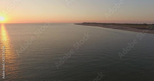 Aerial: The beach between Vlissingen and Dishoek during sunset. photo