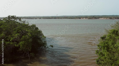 Aerial: Kitesurfing in the river delta of Parnaiba, Northern Brazil. photo