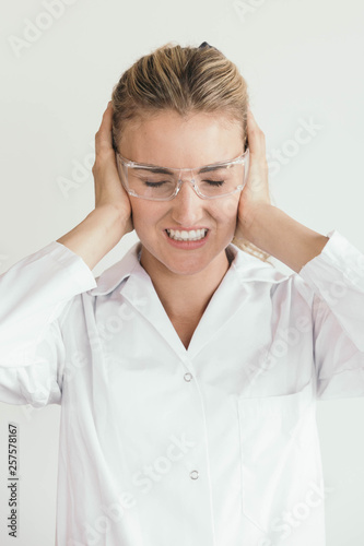 Female Scientist Having a Headache