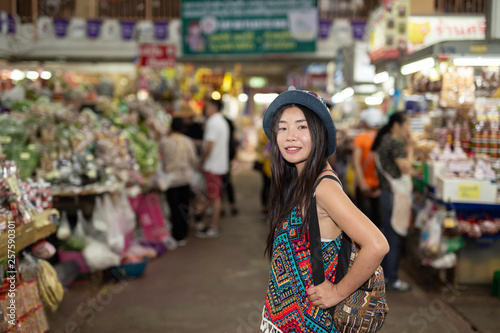 Women are happy to walk shopping at the market. Tourism concept