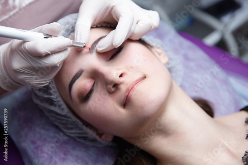 Microblading eyebrows workflow in a beauty salon © burdun