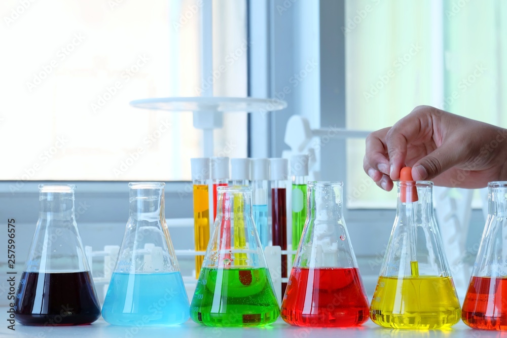 Chemical tube set development and pharmacy in laboratory with multicolored substances in laboratory - Image Chemical tube set development and pharmacy in laboratory with multicolored substances in laboratory - Image