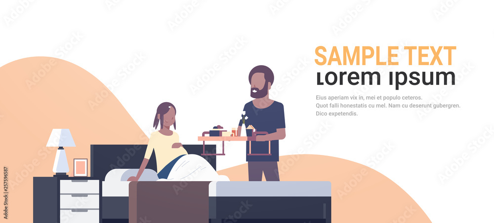 husband bringing breakfast tray for pregnant wife sitting on bed man serving food happy african american family future parents in love horizontal copy space
