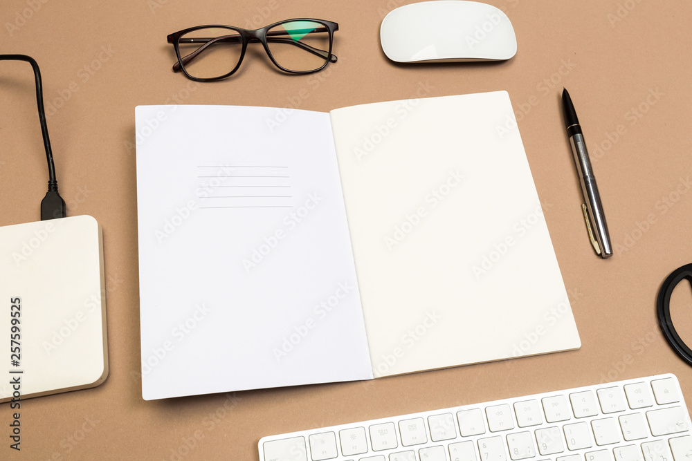 office desk table with keyboard notebook disk glasses and scissors. Mock up template . Top view. office desk table with keyboard notebook disk glasses and scissors. Mock up template . Top view.